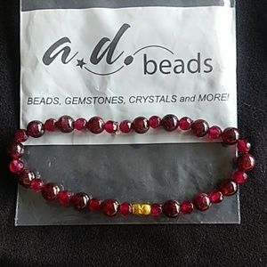 Garnet and 24k gold bracelet